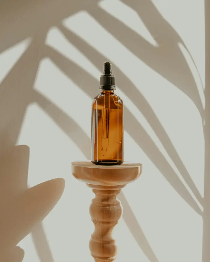Flacone di olio per capelli in vetro ambrato